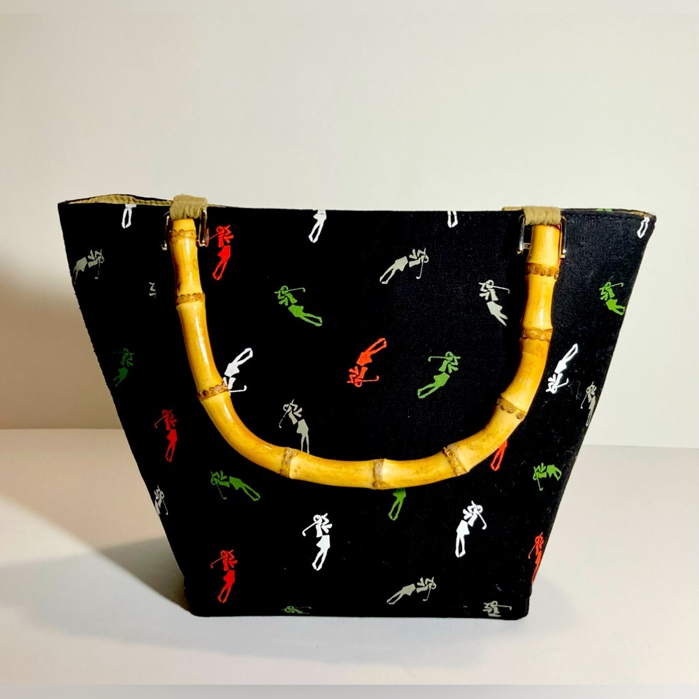 LIZ CLAIBORNE BLACK TOTE WITH GOLF PLAYER LOGO’s.  SNAP CLOSURE